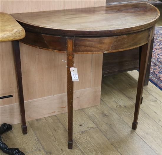 A George III inlaid mahogany card table W.91cm